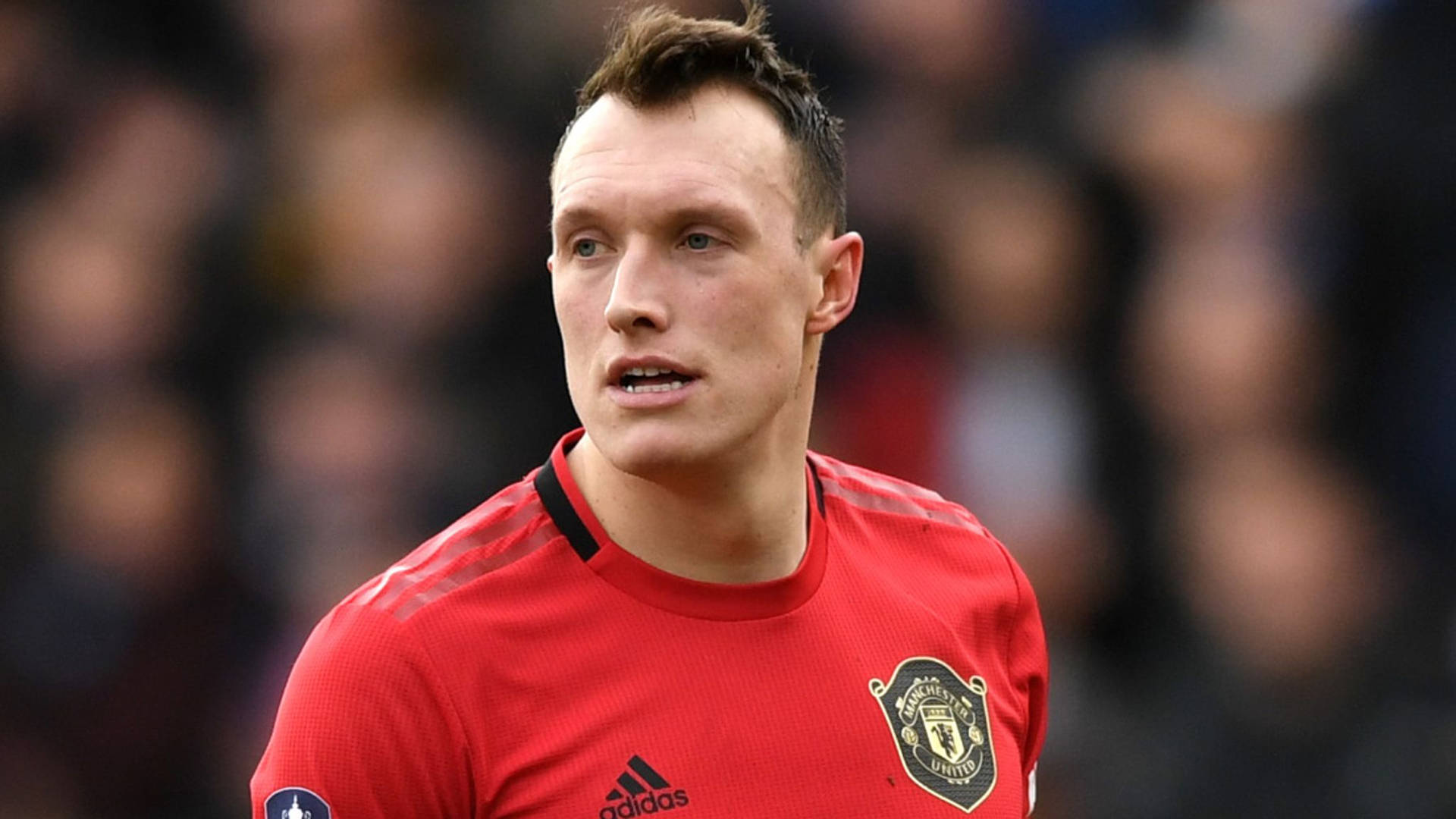 Phil Jones Looking To Right Background