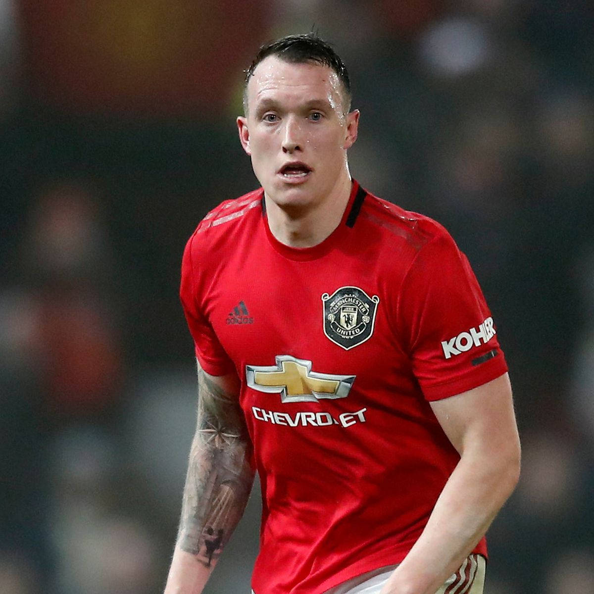 Phil Jones Manchester United Black Crest Background