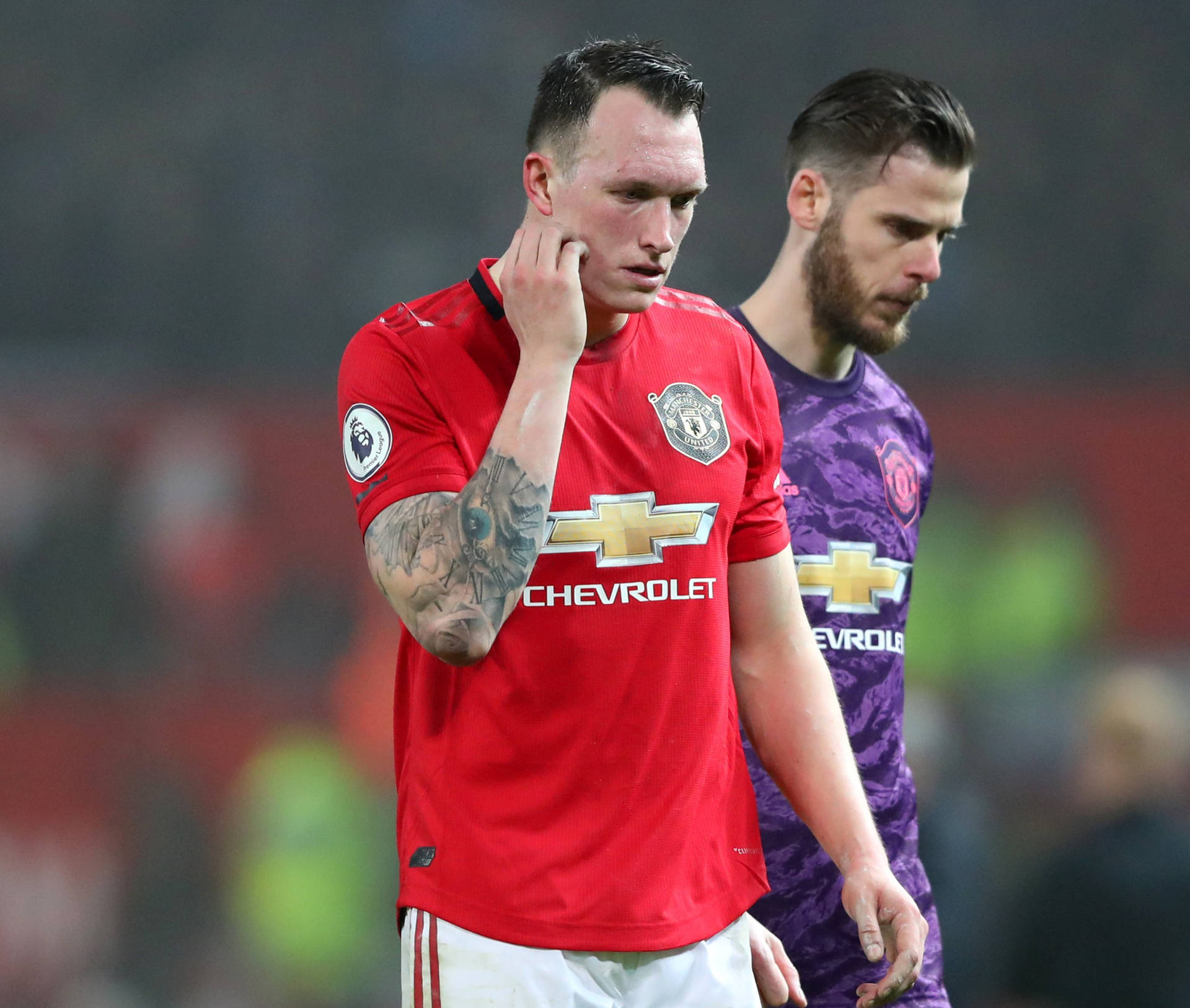 Phil Jones Scratching Face Background