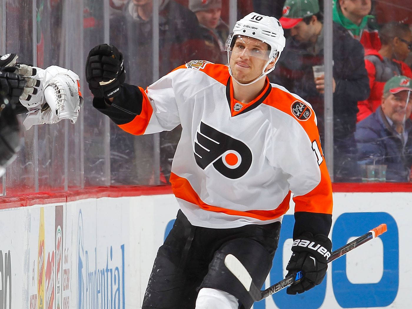 Philadelphia Flyers Brayden Schenn Fist Bump With Teammate Background