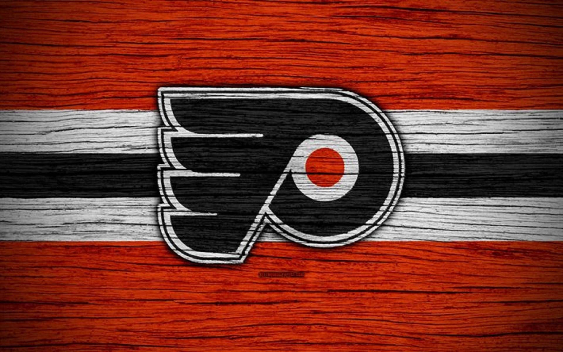 Philadelphia Flyers Logo On Red Wood Background