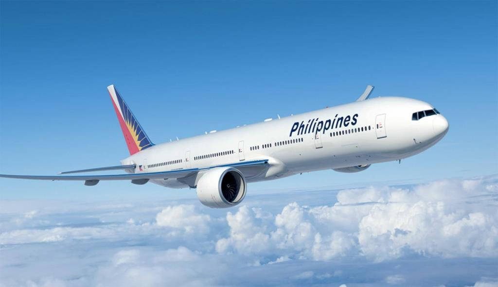 Philippine Airlines Above Sea Of Clouds Background