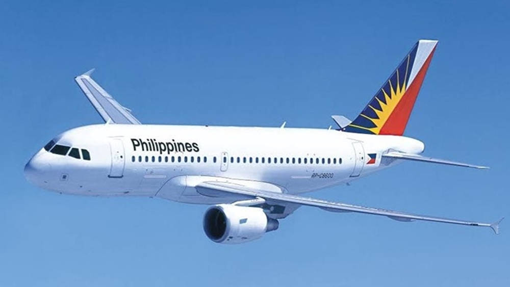 Philippine Airlines Flying White Airplane Background