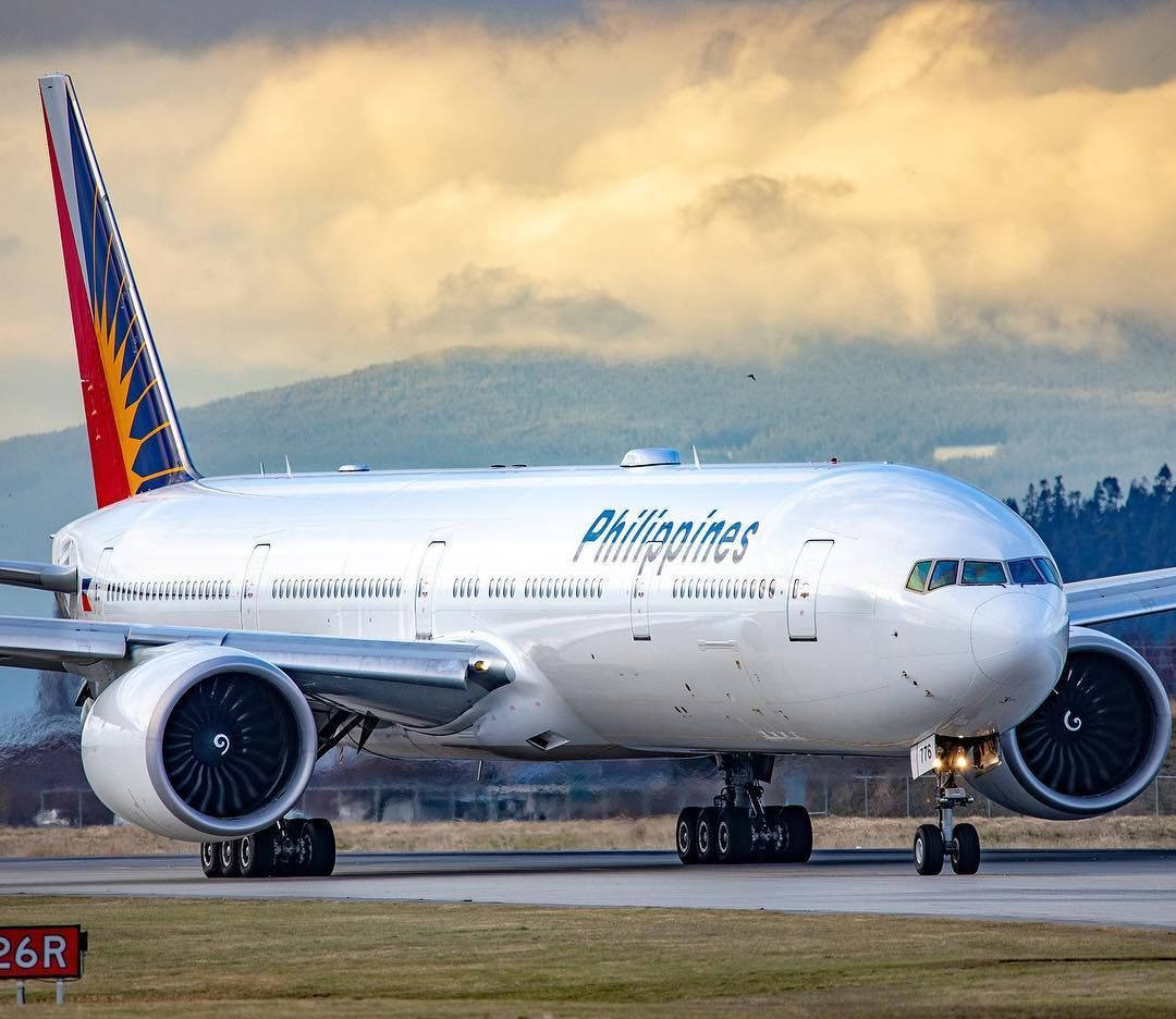 Philippine Airlines On Airport Runway Background