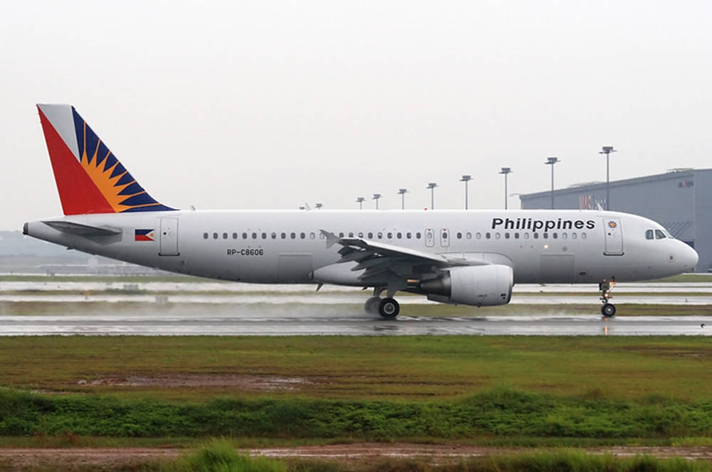 Philippine Airlines Parked Passenger Airplane Background