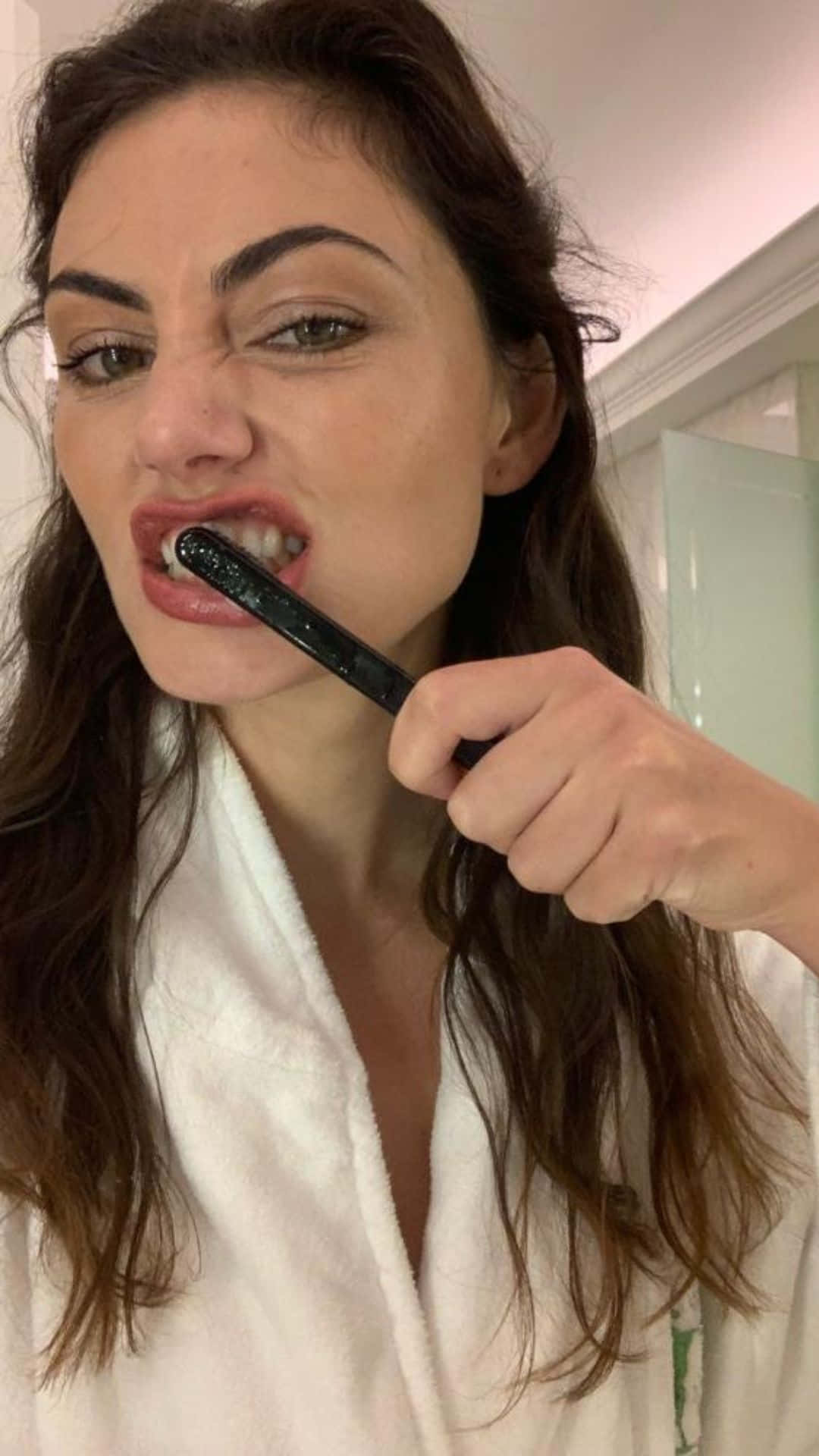 Phoebe Tonkin Brushing Teeth Background