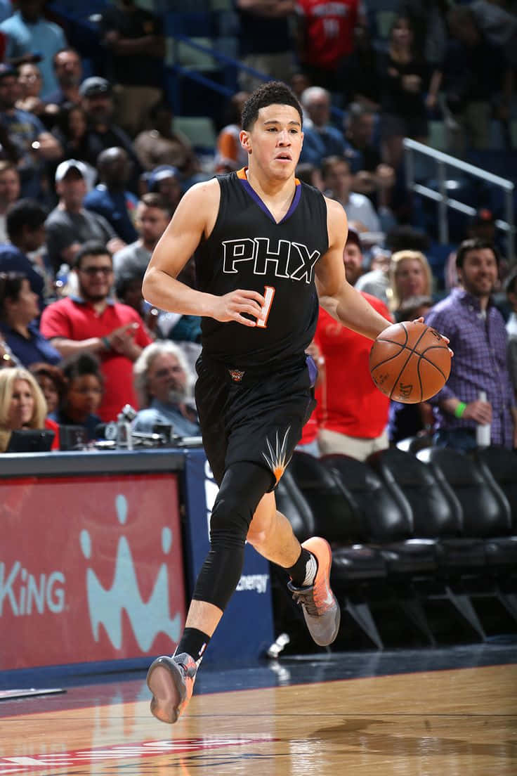 Phoenix Suns Shooting Guard Devin Booker Showcasing His New Iphone Background
