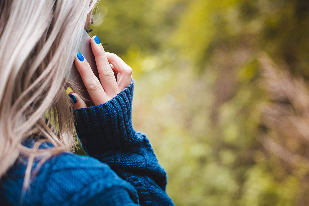 Phone Call Woman With Blue Sweater