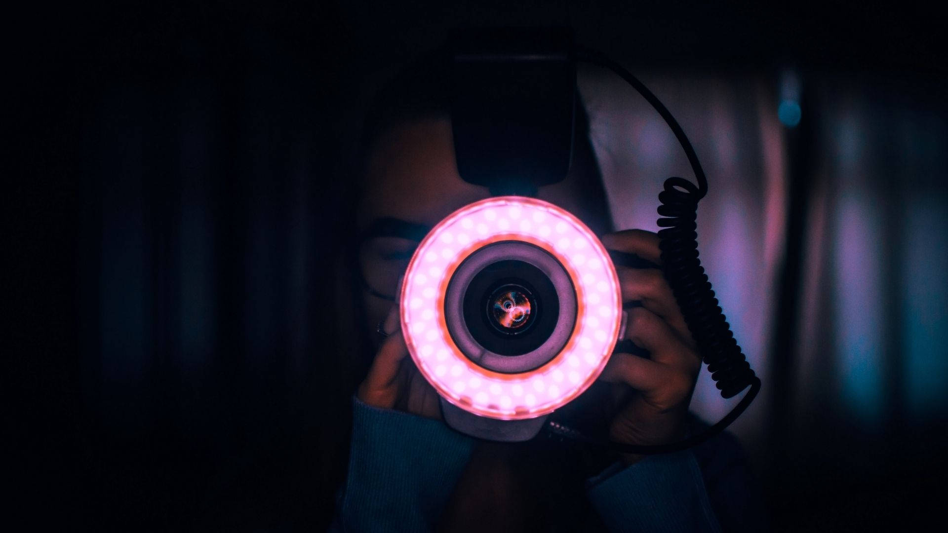 Photographer With Pink Ring Light