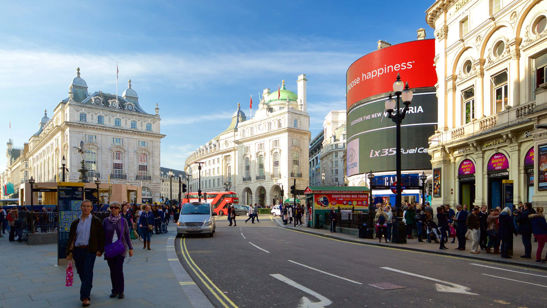 Piccadilly Circus Busy Road With Blue Sky Background