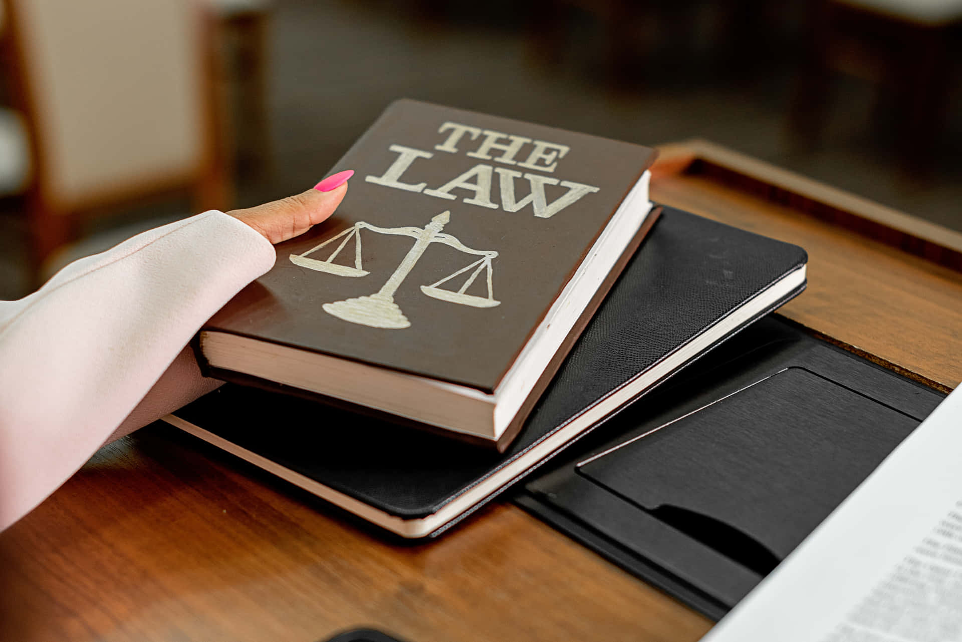 Picking Up Book On Judicious Law Background