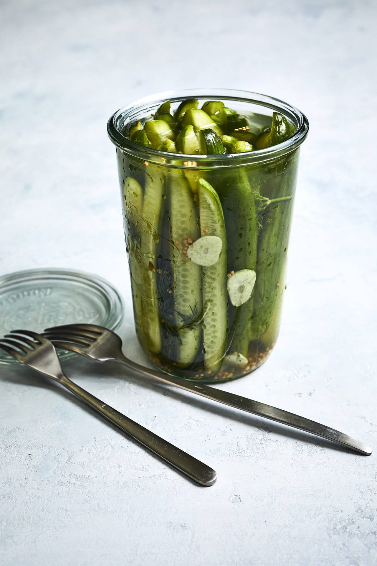 Pickles In A Glass Cup Background