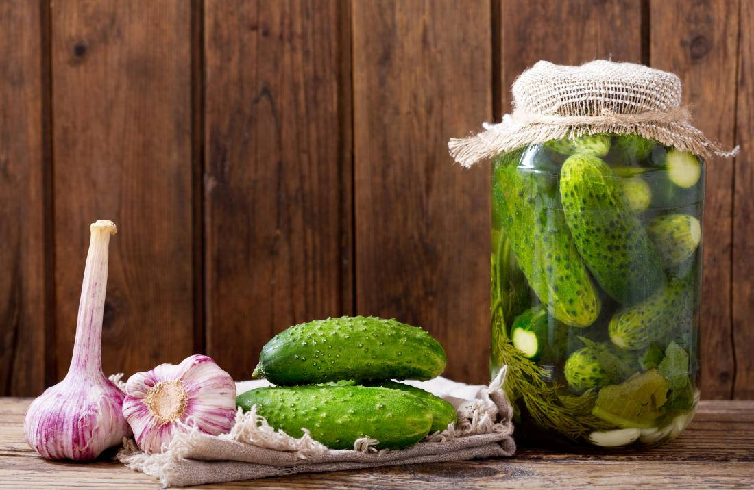 Pickles In Jar Burlap Lid Background