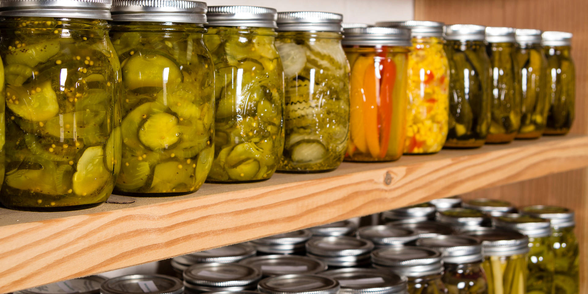 Pickles In Wooden Shelf Background