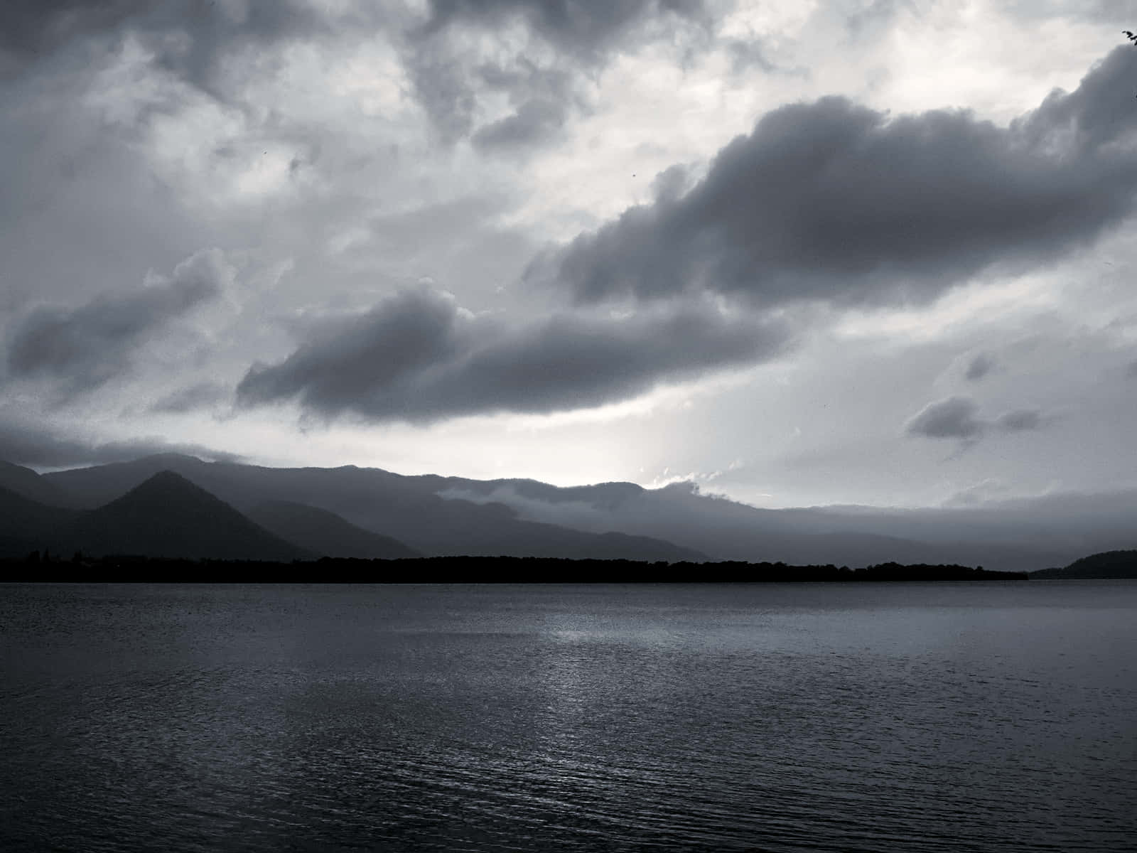 Picture Of A Black And White Sky With Billowy Clouds Background