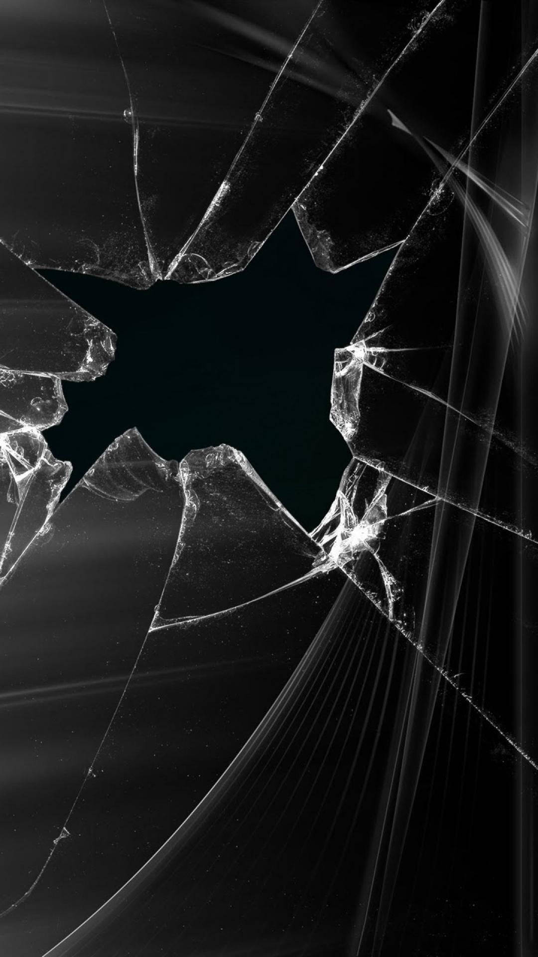 Picture Of Broken Glass With Hole Background