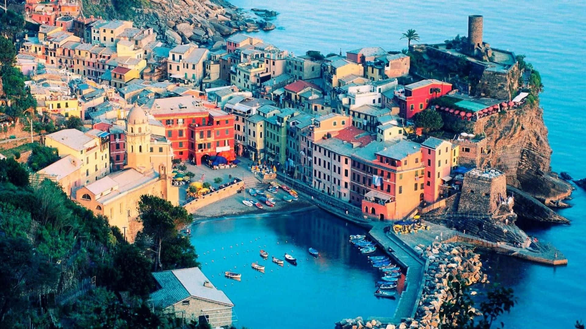 Picturesque Coastal Villageat Dusk Background