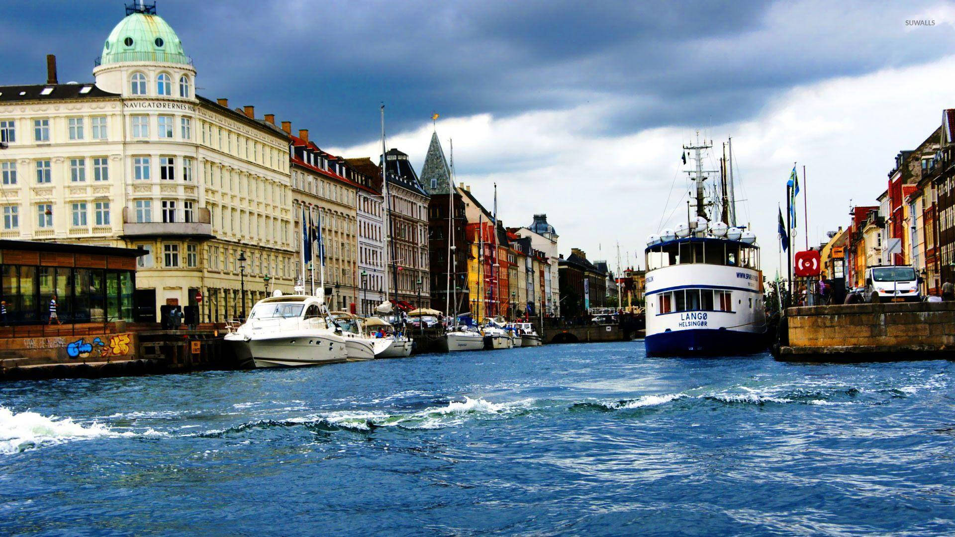 Picturesque Nyhavn Harbor In Vibrant Copenhagen