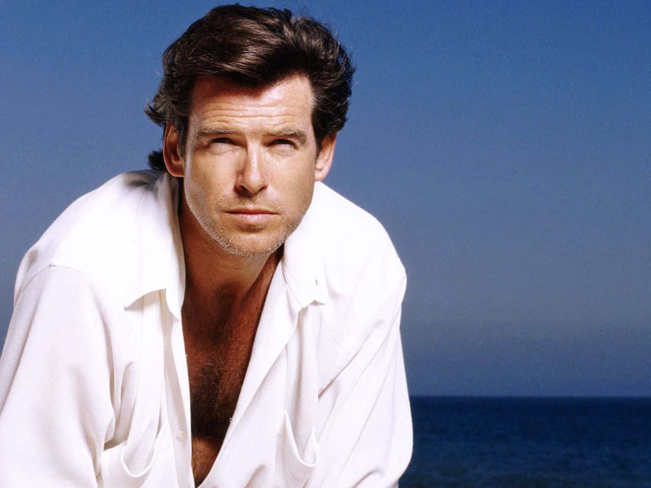 Pierce Brosnan During The Early Years Of His Film Career Background