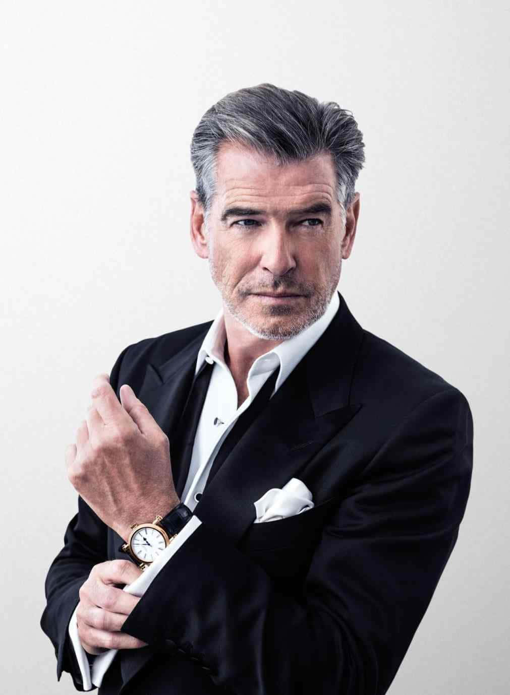 Pierce Brosnan Looking Handsome In A White Shirt And Sunglasses.