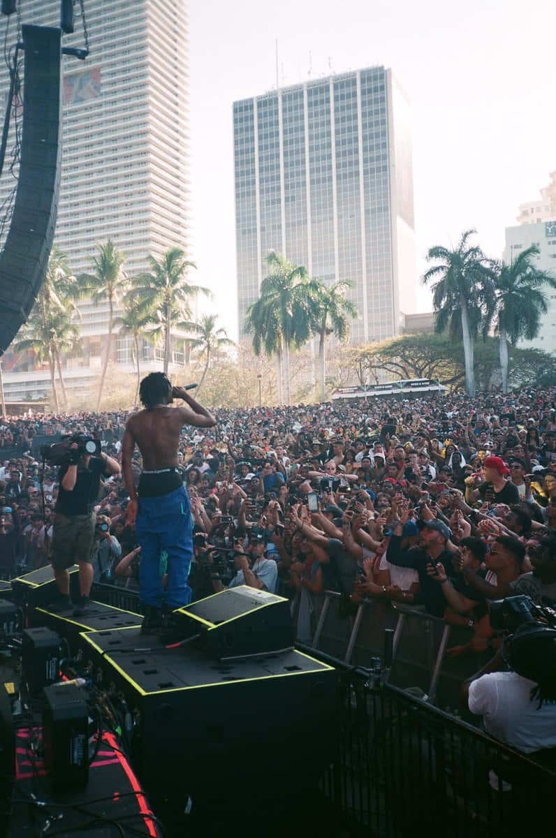 Pierre Bourne Beams In The Spotlight Background