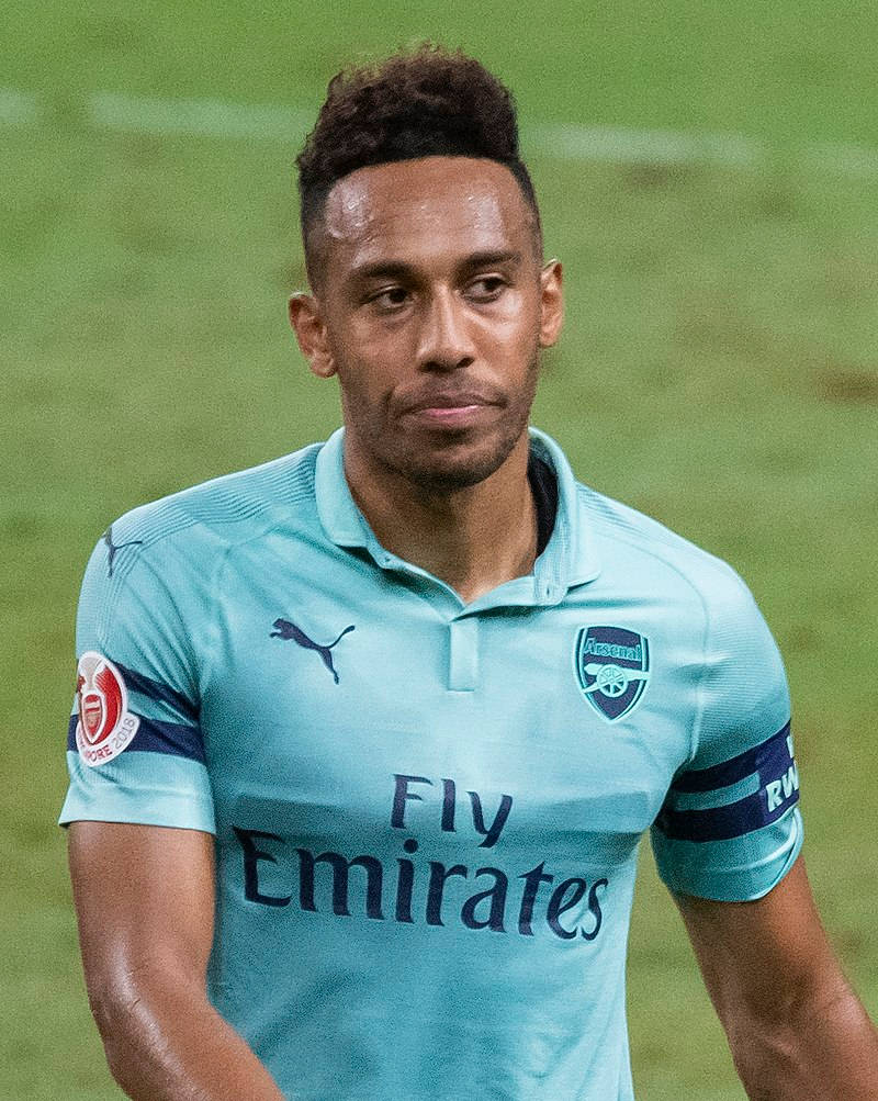 Pierre-emerick Aubameyang In Arsenal Jersey Background