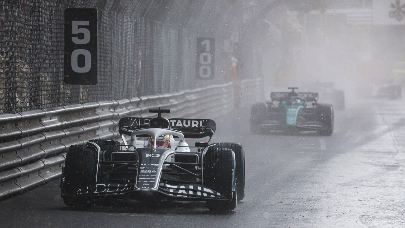 Pierre Gasly Car In Pouring Rain Background