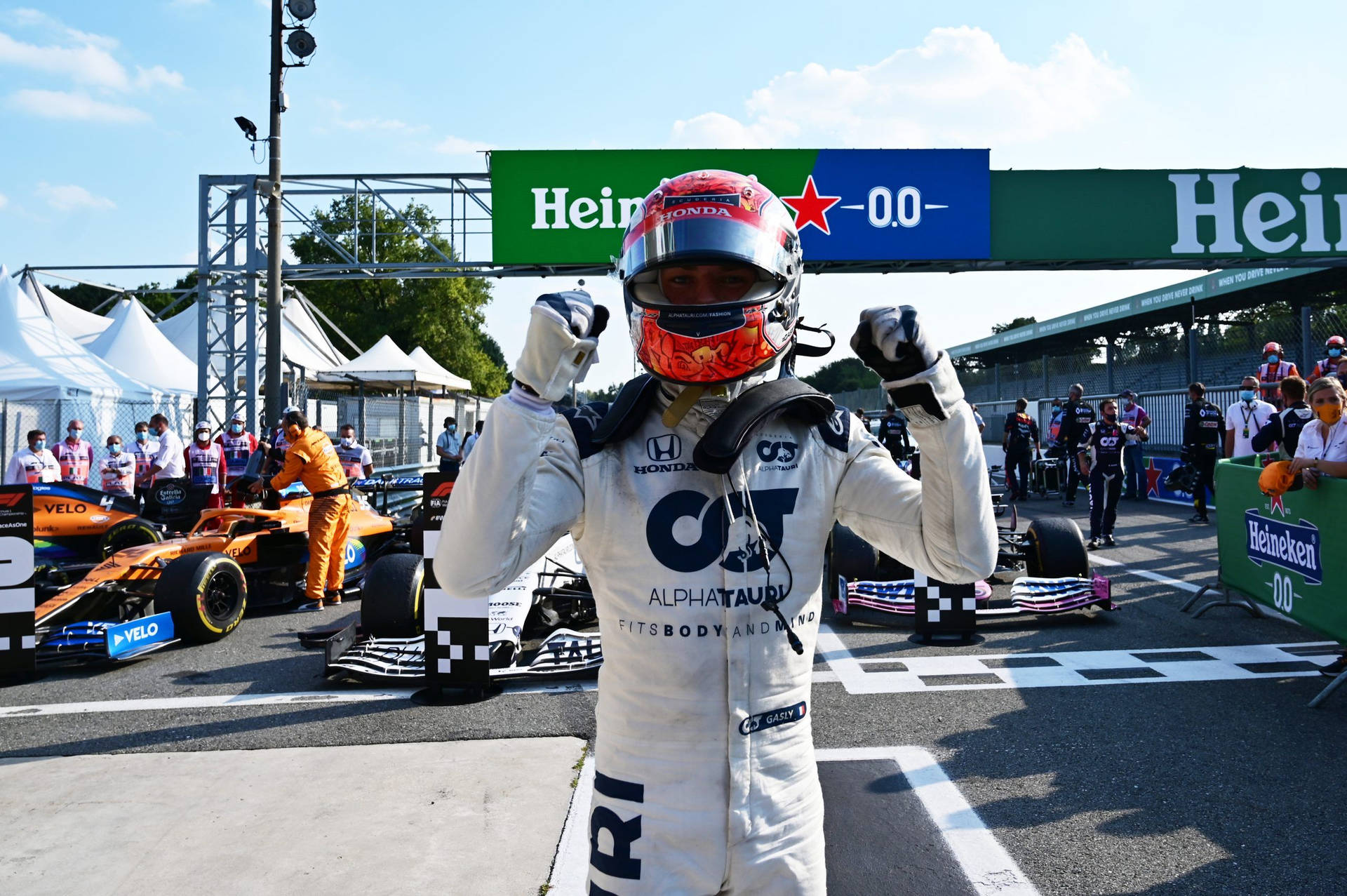 Pierre Gasly, Formula One Racer, Positioned On His Race Track.