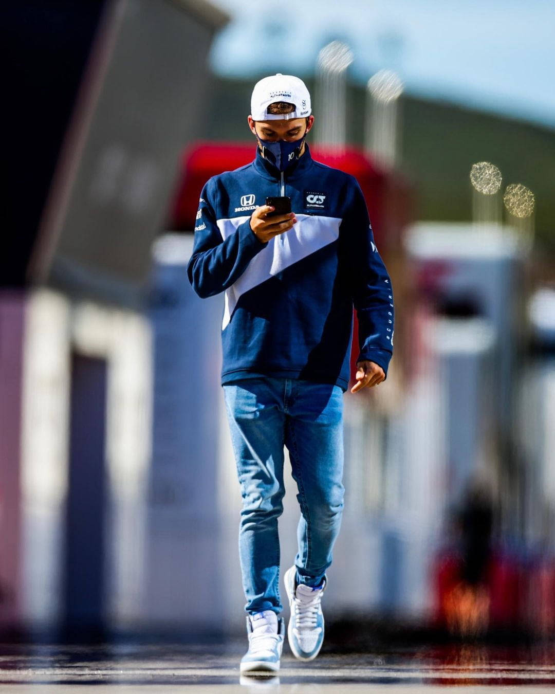 Pierre Gasly Holding His Phone Background