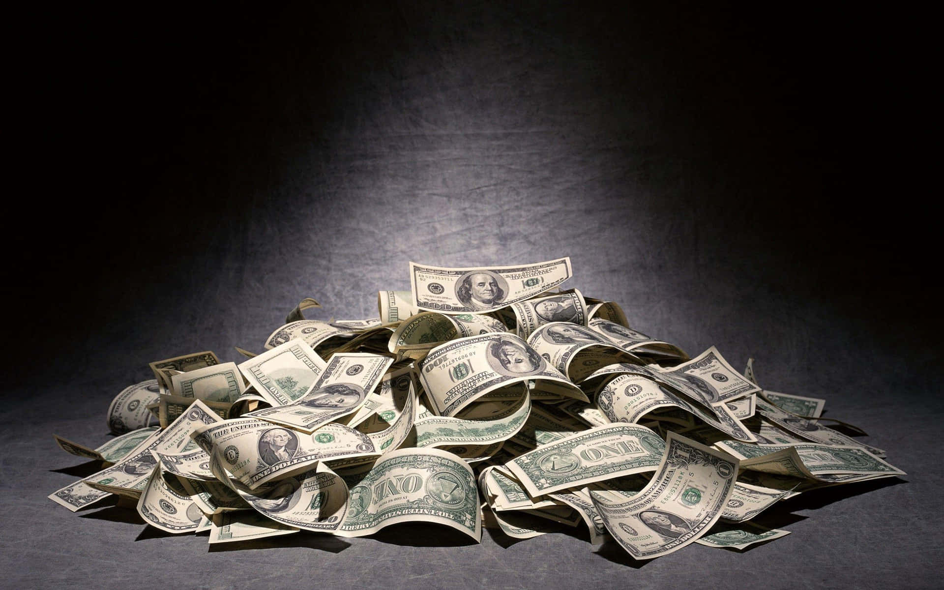 Pile Of Money On A Dark Background Background