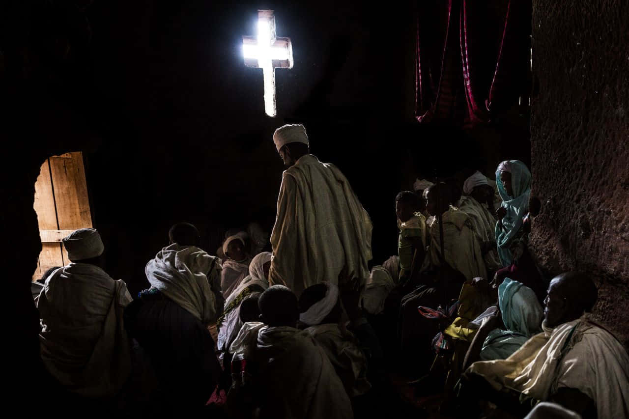 Pilgrims In New Jerusalem In Lalibela Background