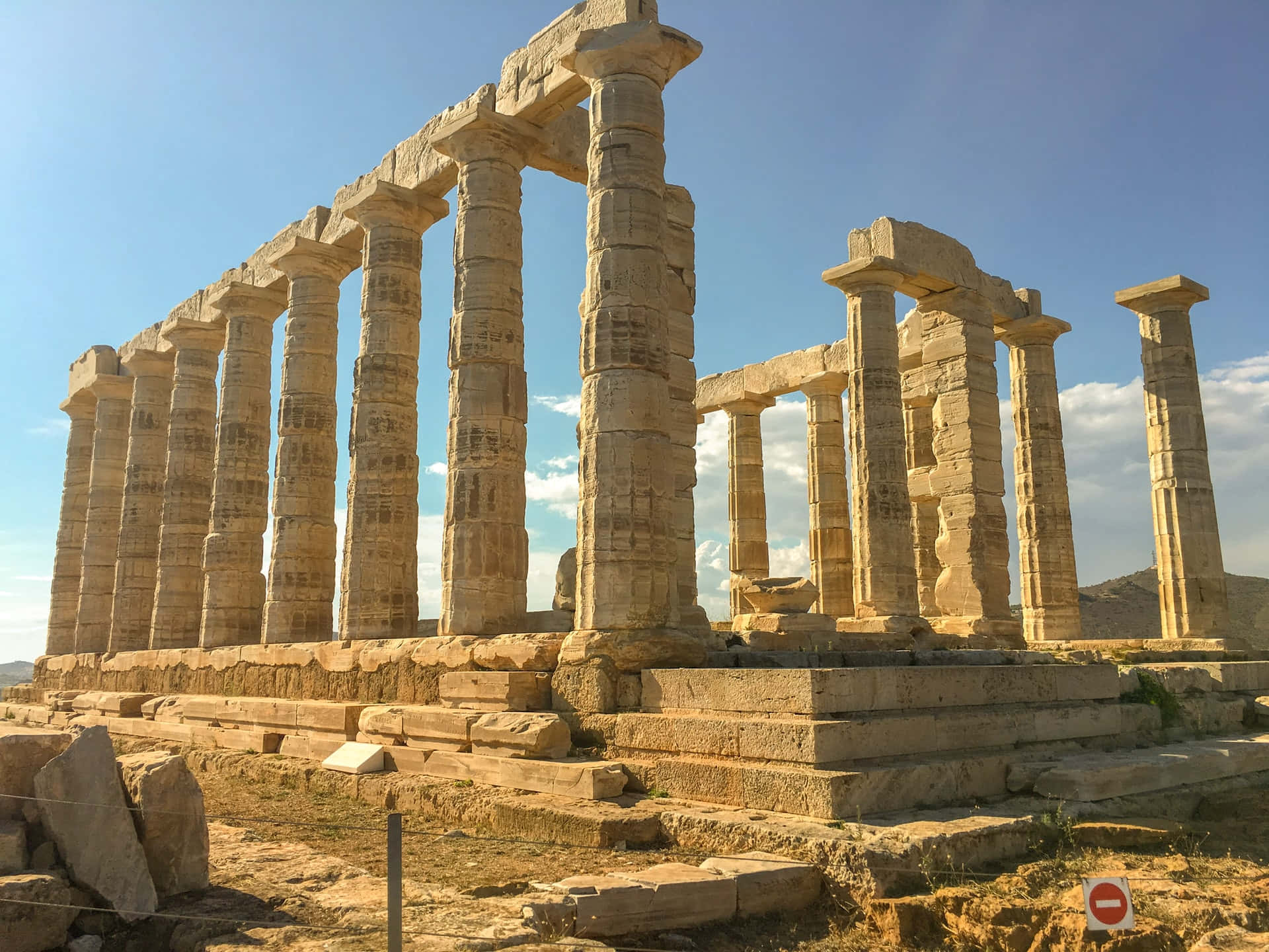 Pillars And Temple Ruins Sounion Background