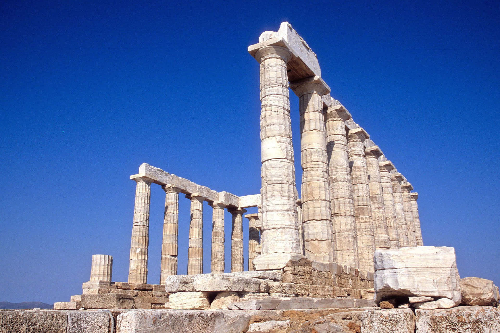 Pillars Contrasting Blue Sky Sounion Background