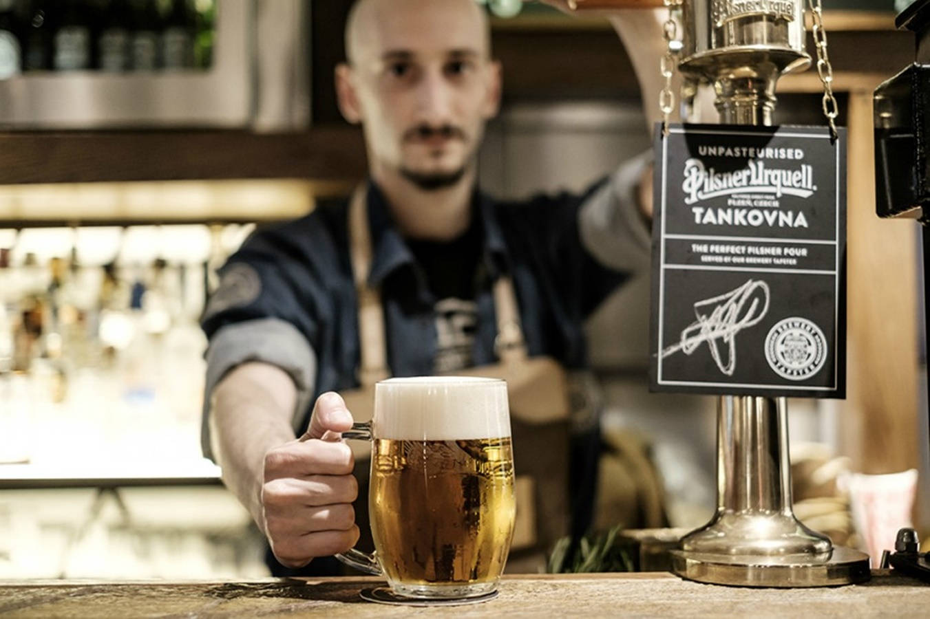 Pilsner Urquell Bartender Background