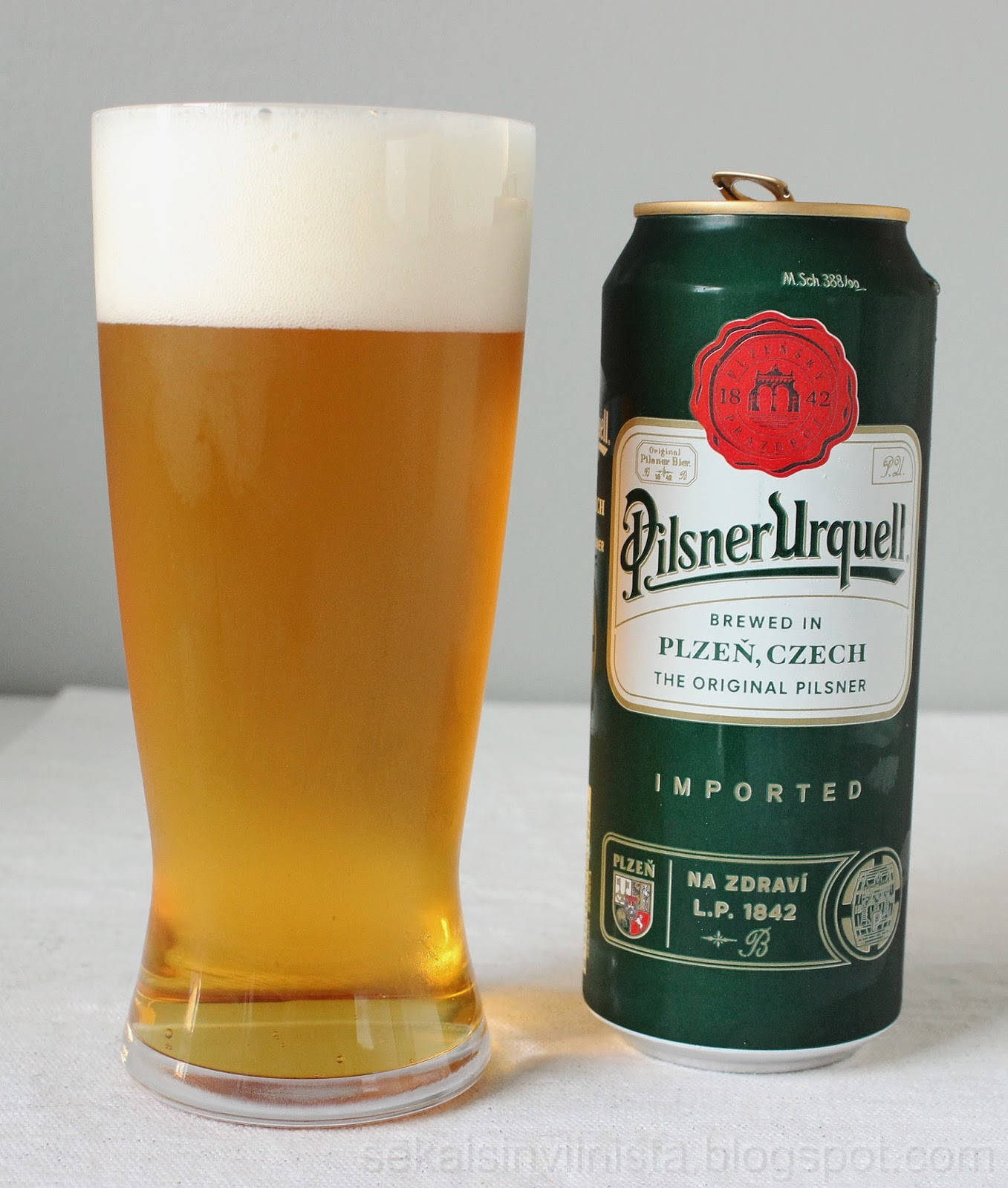 Pilsner Urquell Beer On Can Background