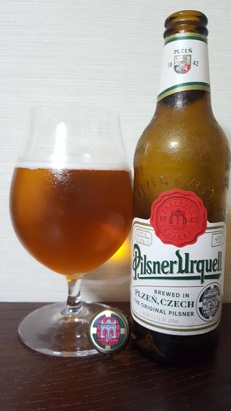 Pilsner Urquell Refreshment In Glass Background