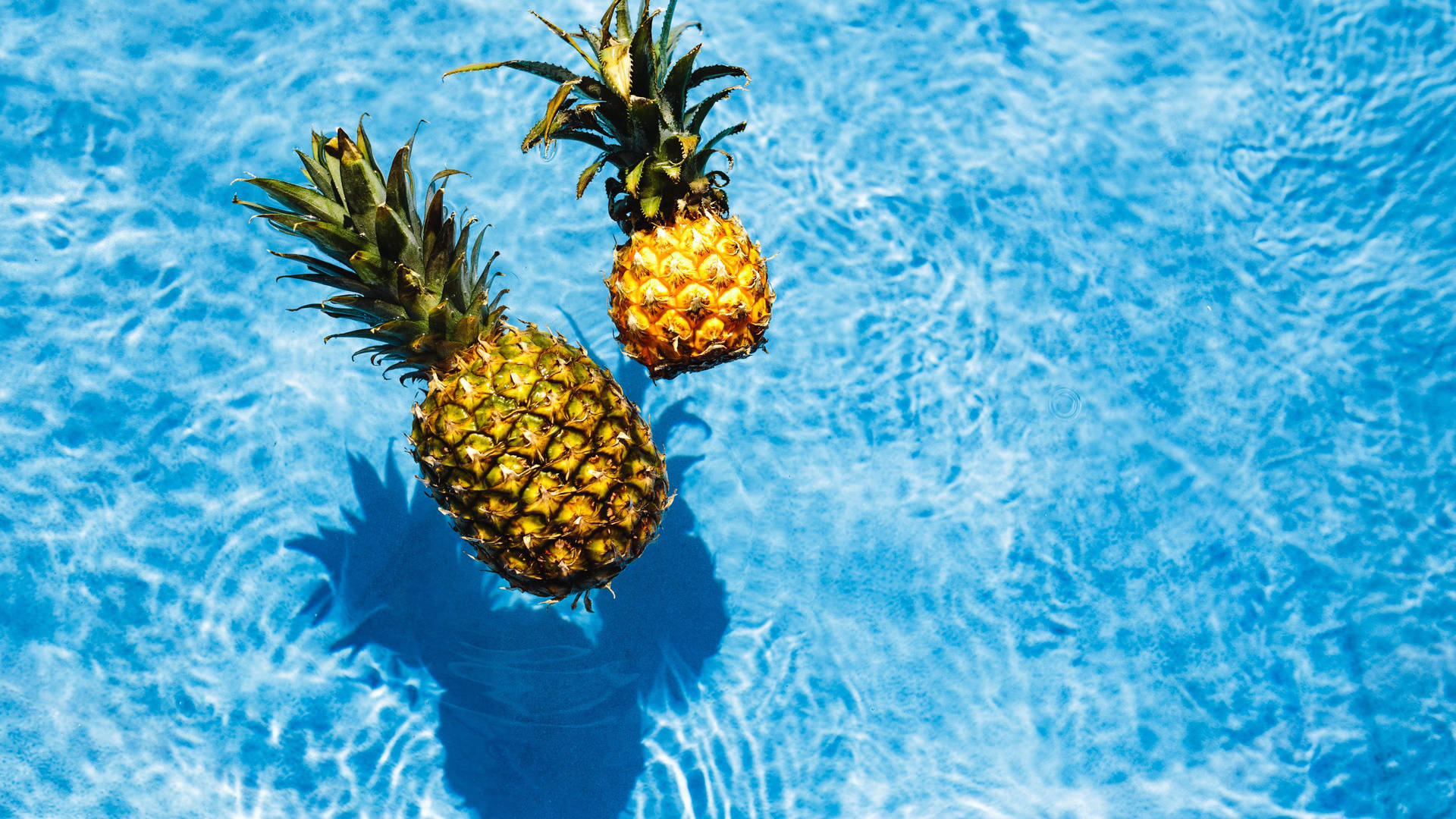 Pineapples In Swimming Pool Background