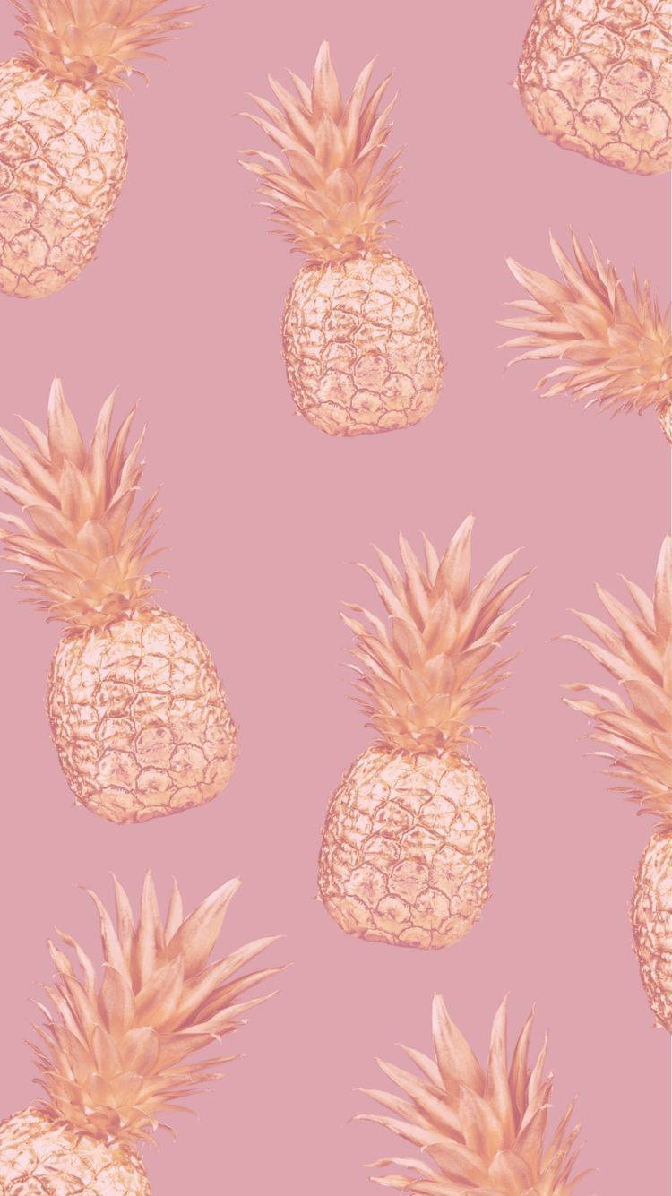 Pineapples On A Pink Background Background