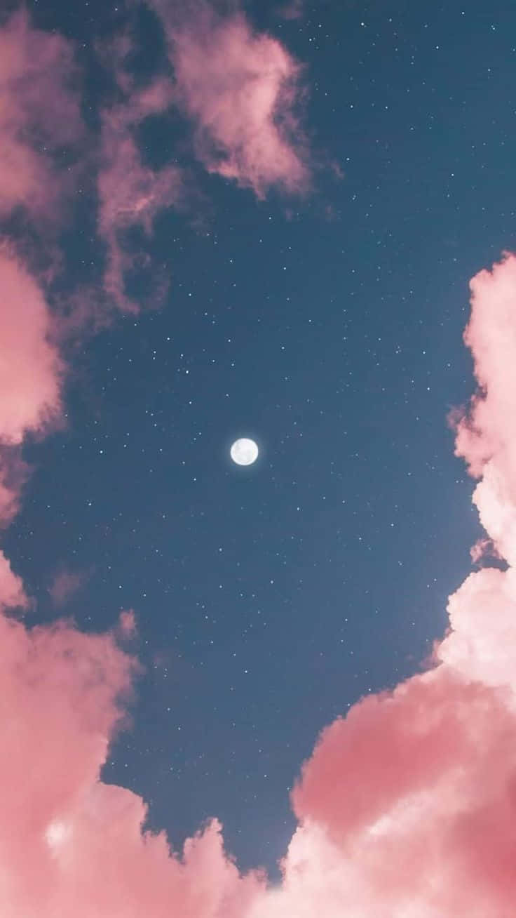 Pink And Blue Clouds And Moon Background