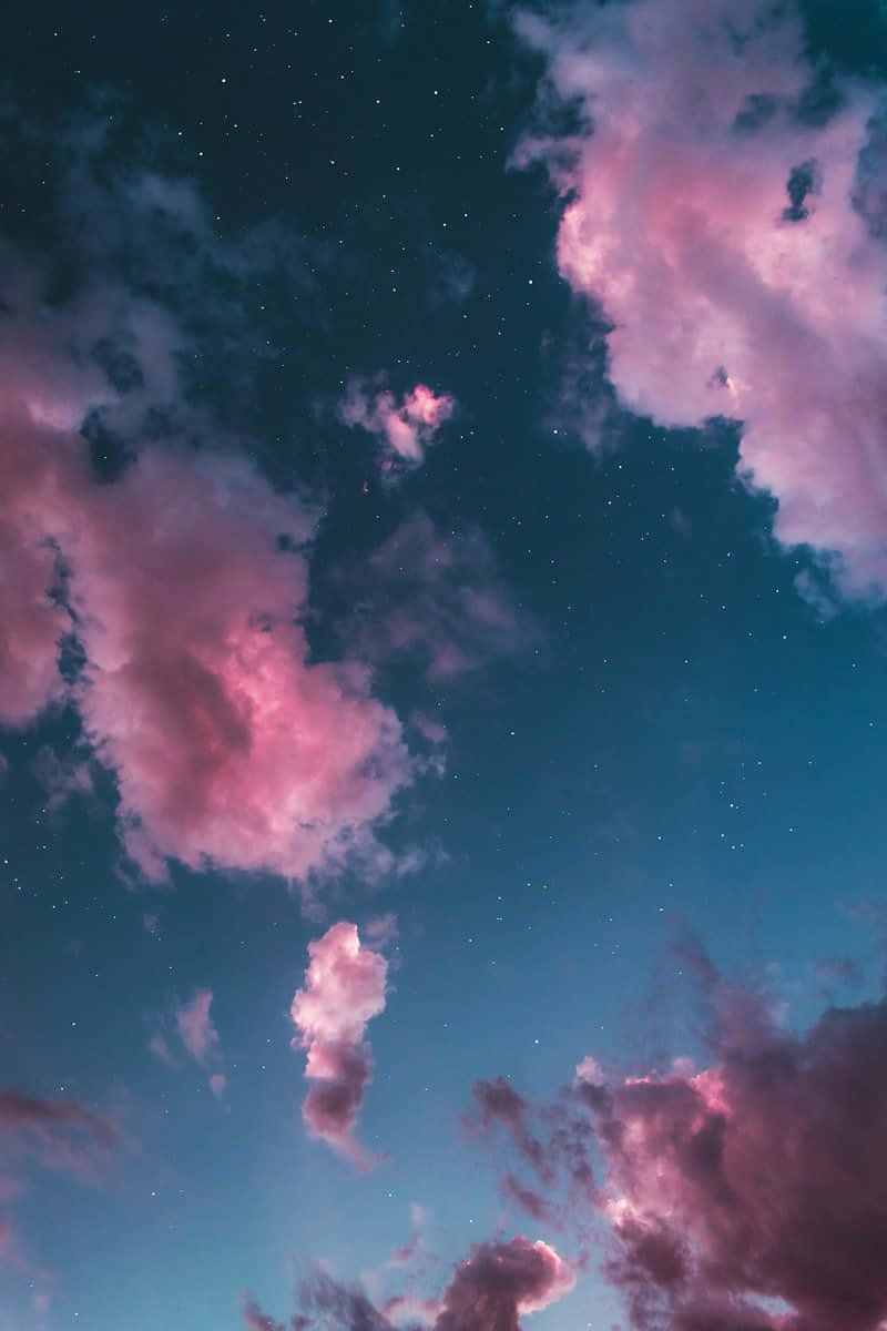 Pink And Blue Clouds Group Background