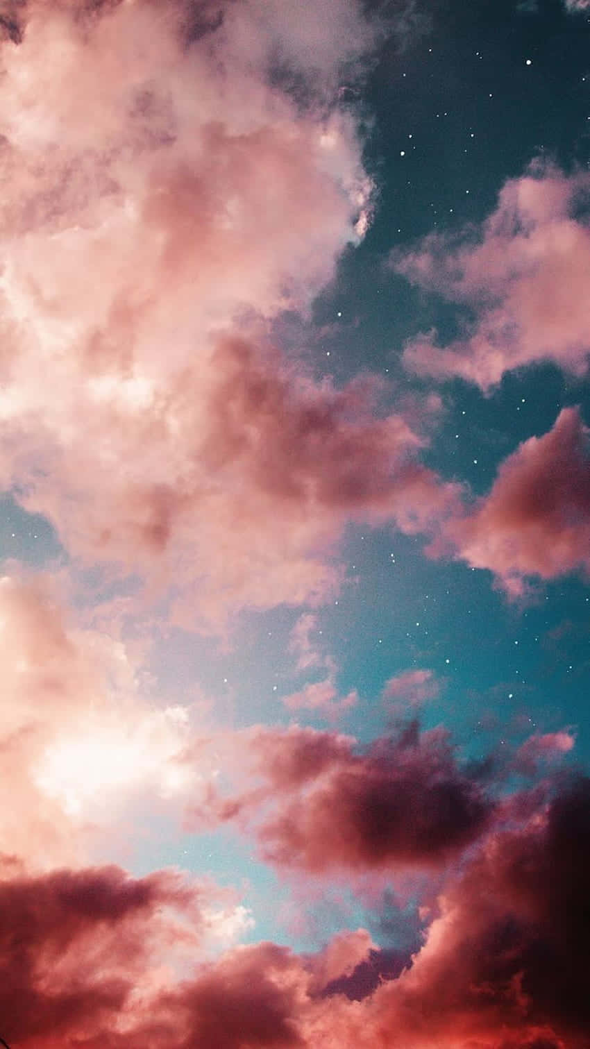 Pink And Blue Clouds With Purple Hue Background