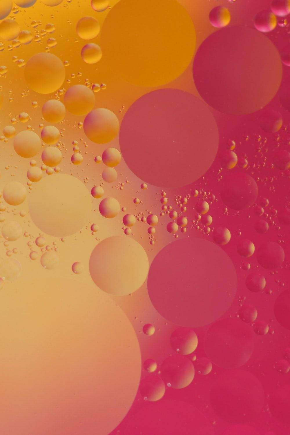 Pink And Orange Circle Bubbles Background