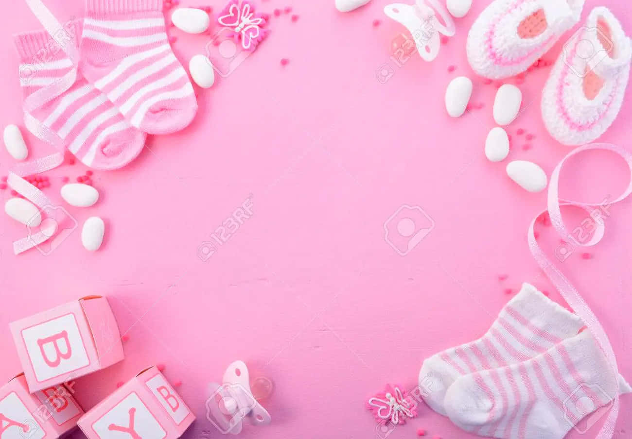 Pink Baby Shower Background With Baby Items And Toys Background