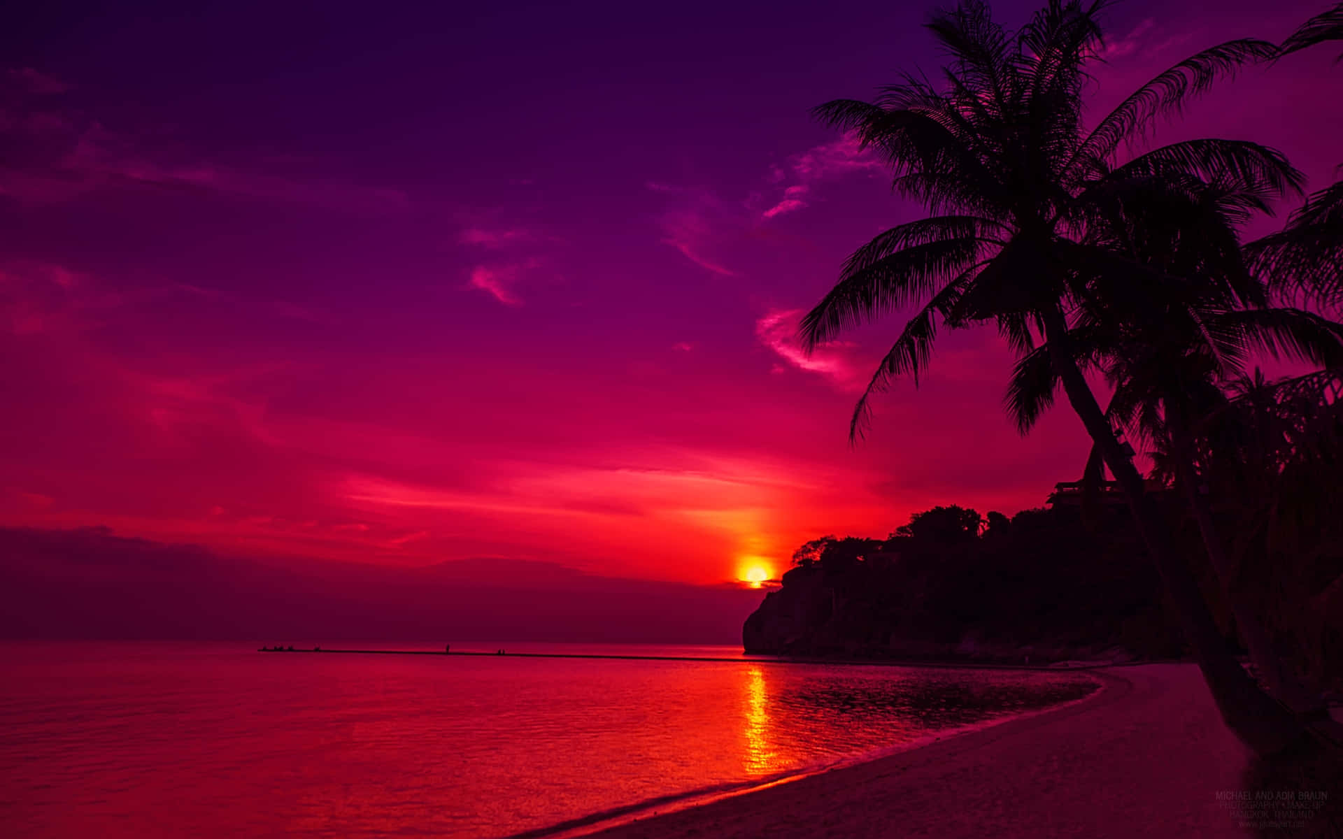 Pink Beach Sunset With A Red Sun Background