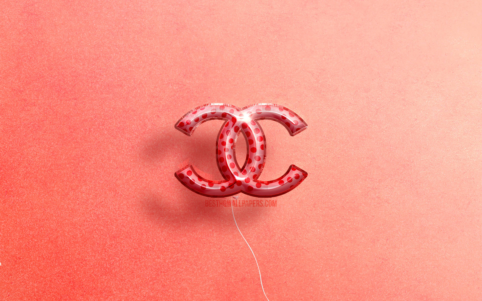 Pink Chanel Logo With Red Dots Background