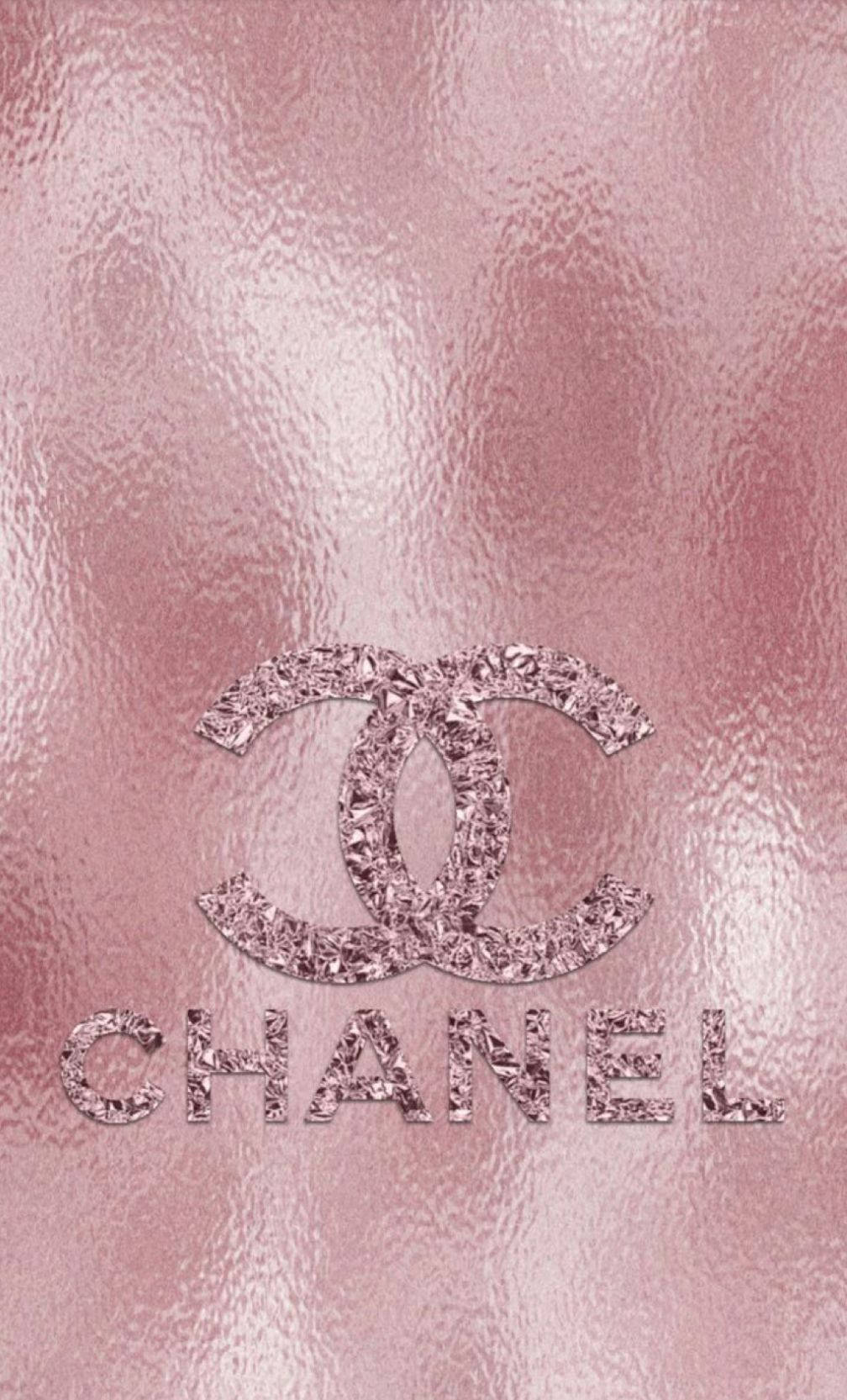 Pink Chanel Logo With Rose Gold Background