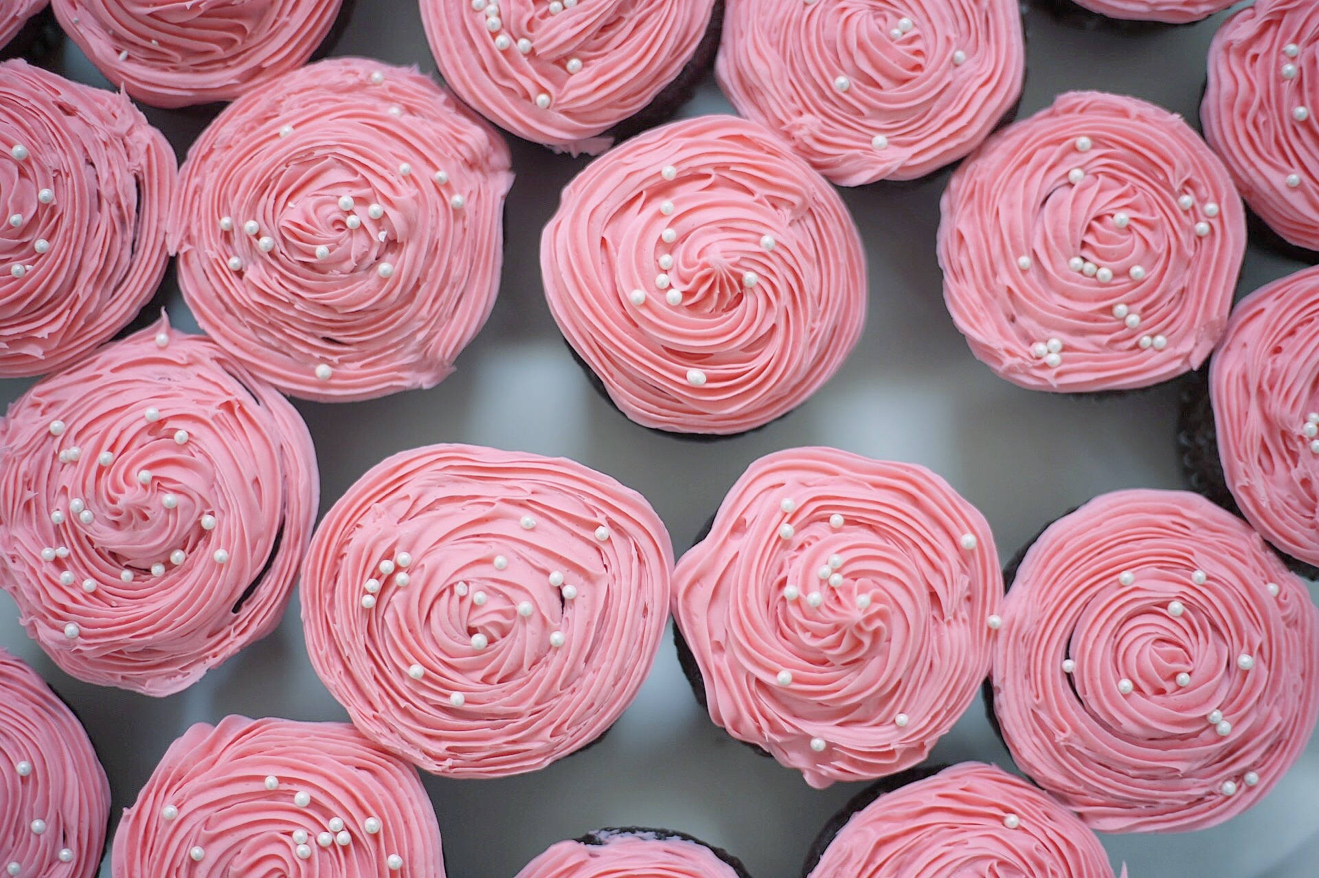 Pink Color Cupcakes Background