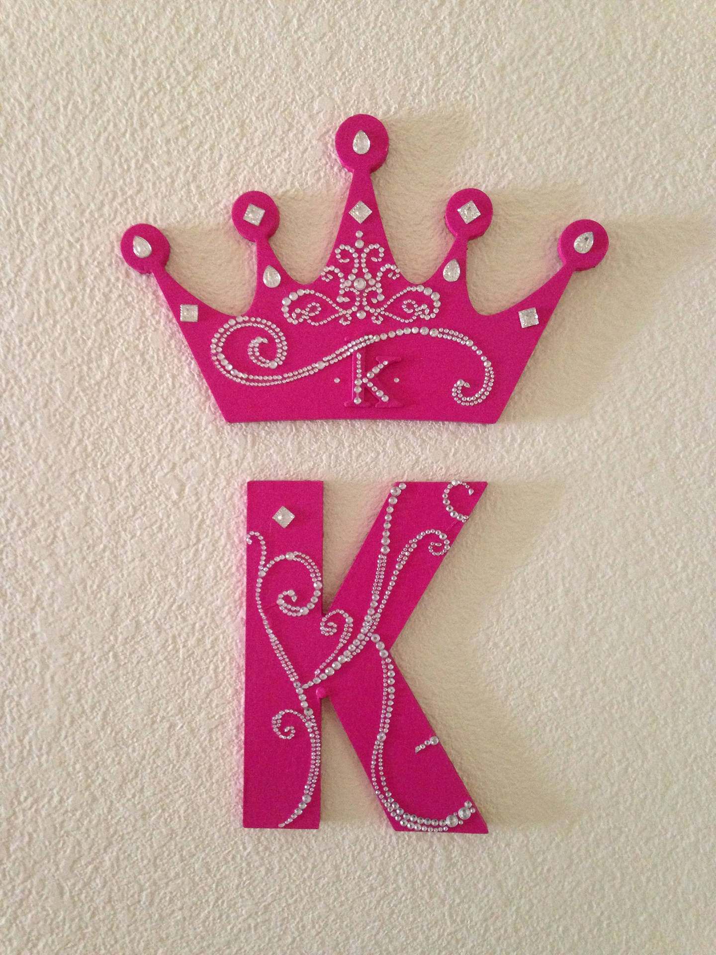 Pink Crown Letter K Background