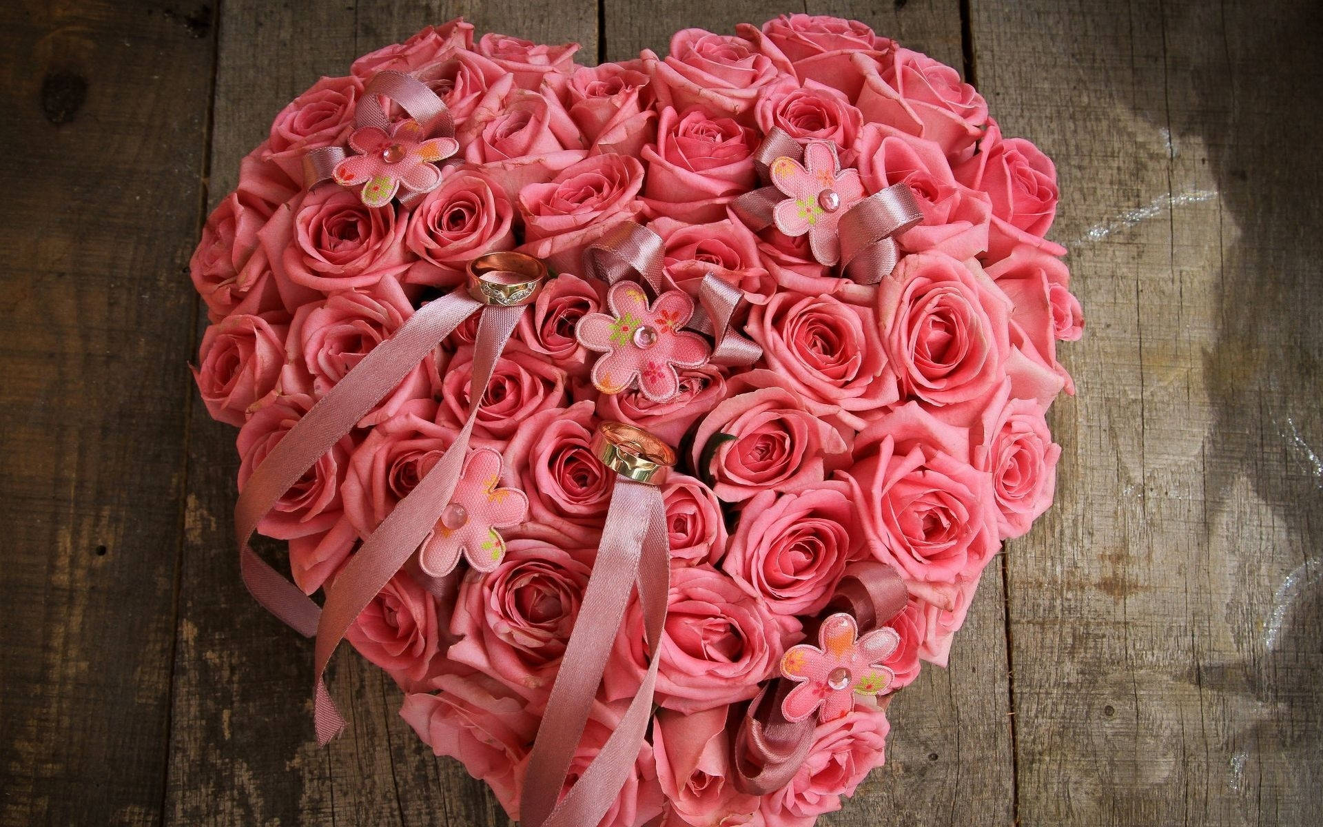 Pink Flower Heart Of Roses With Rings Background