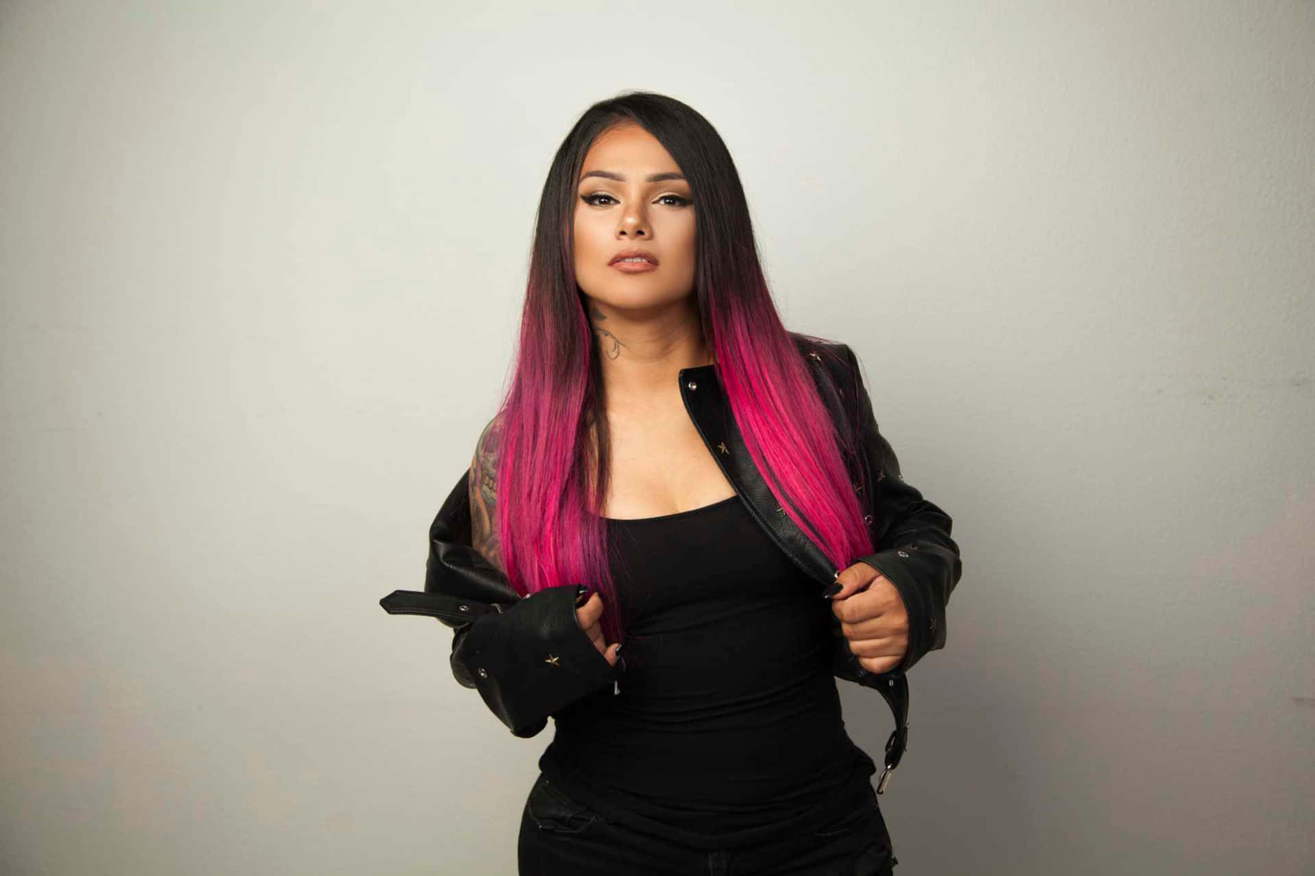 Pink Haired_ Artist_in_ Black_ Leather_ Jacket Background